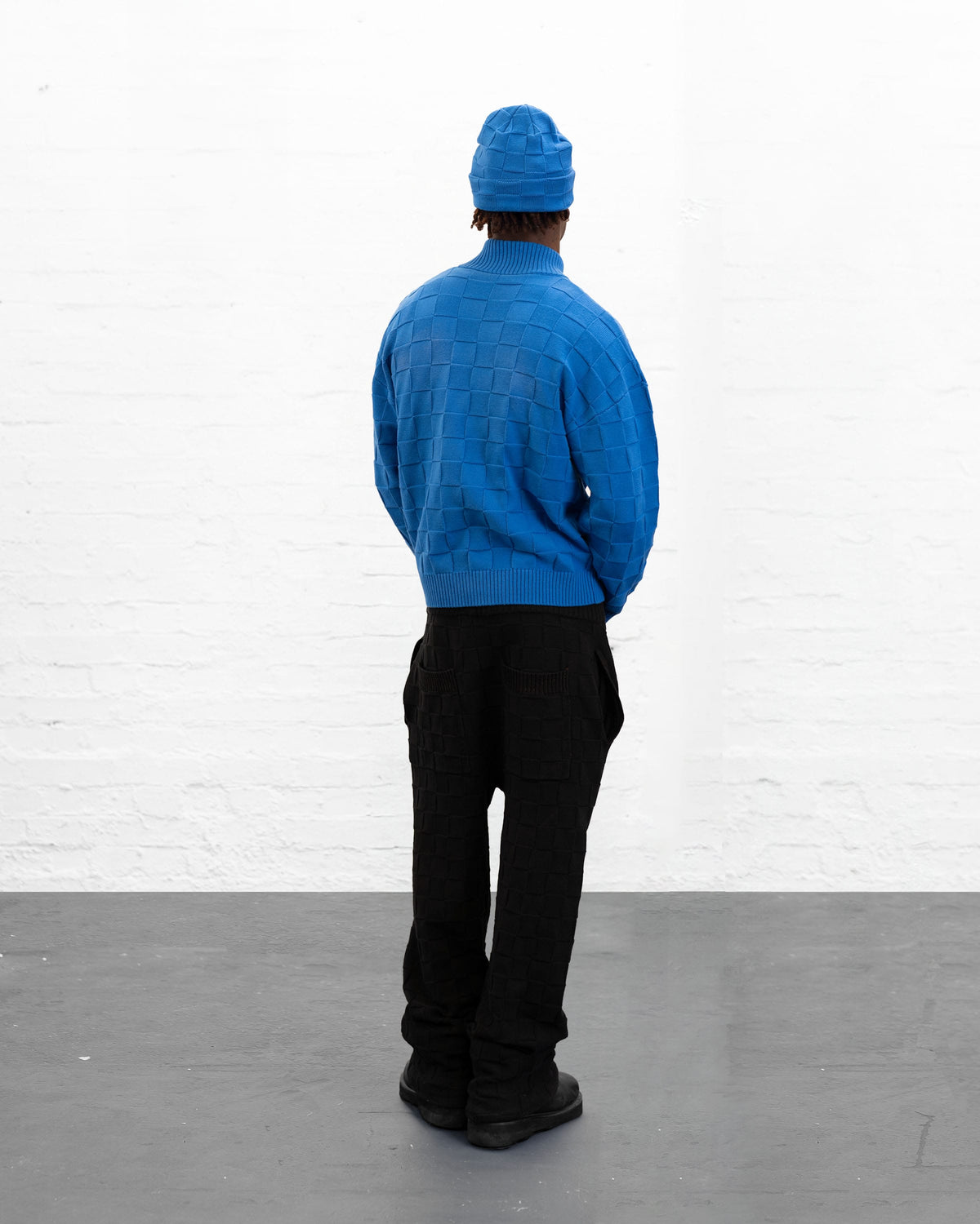 BRYDER blue knitwear zip up jumper on model back view