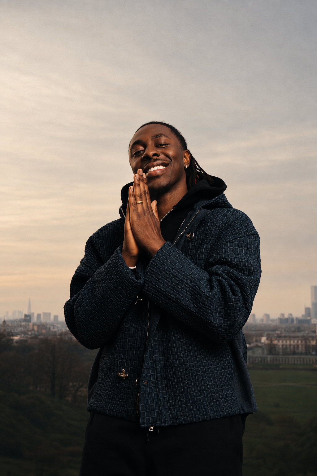 Eberechi Eze wears BRYDER woven denim jacket in fashion shoot in East London.