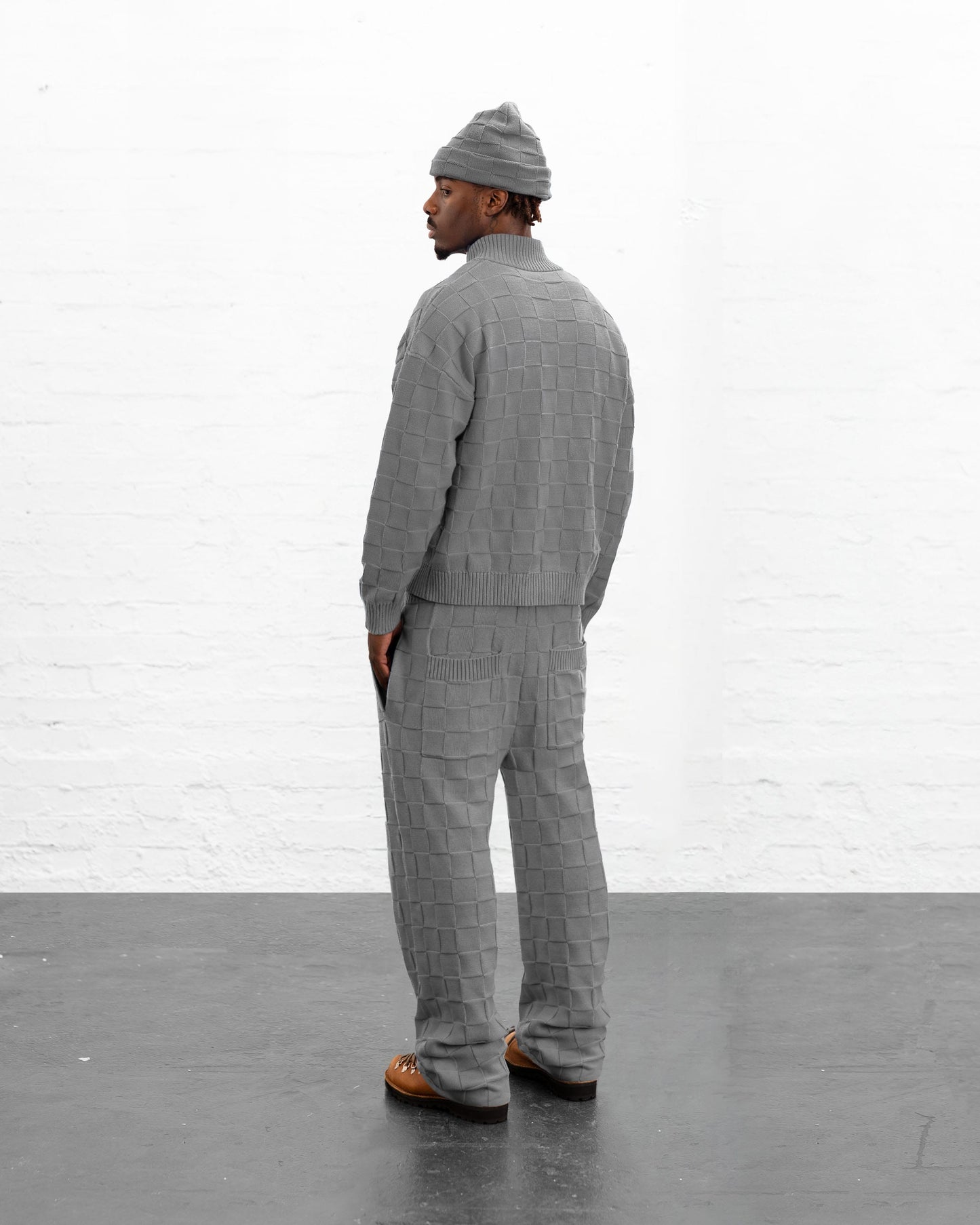 BRYDER grey knitwear zip up jumper on model back view