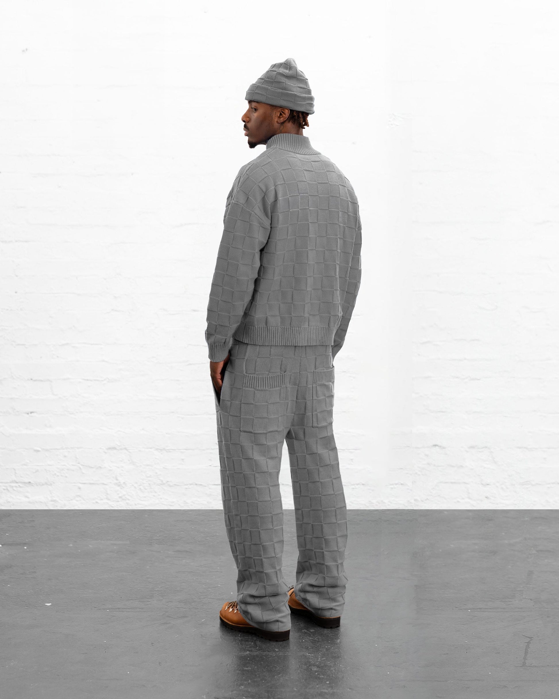 BRYDER grey knitwear zip up jumper on model back view