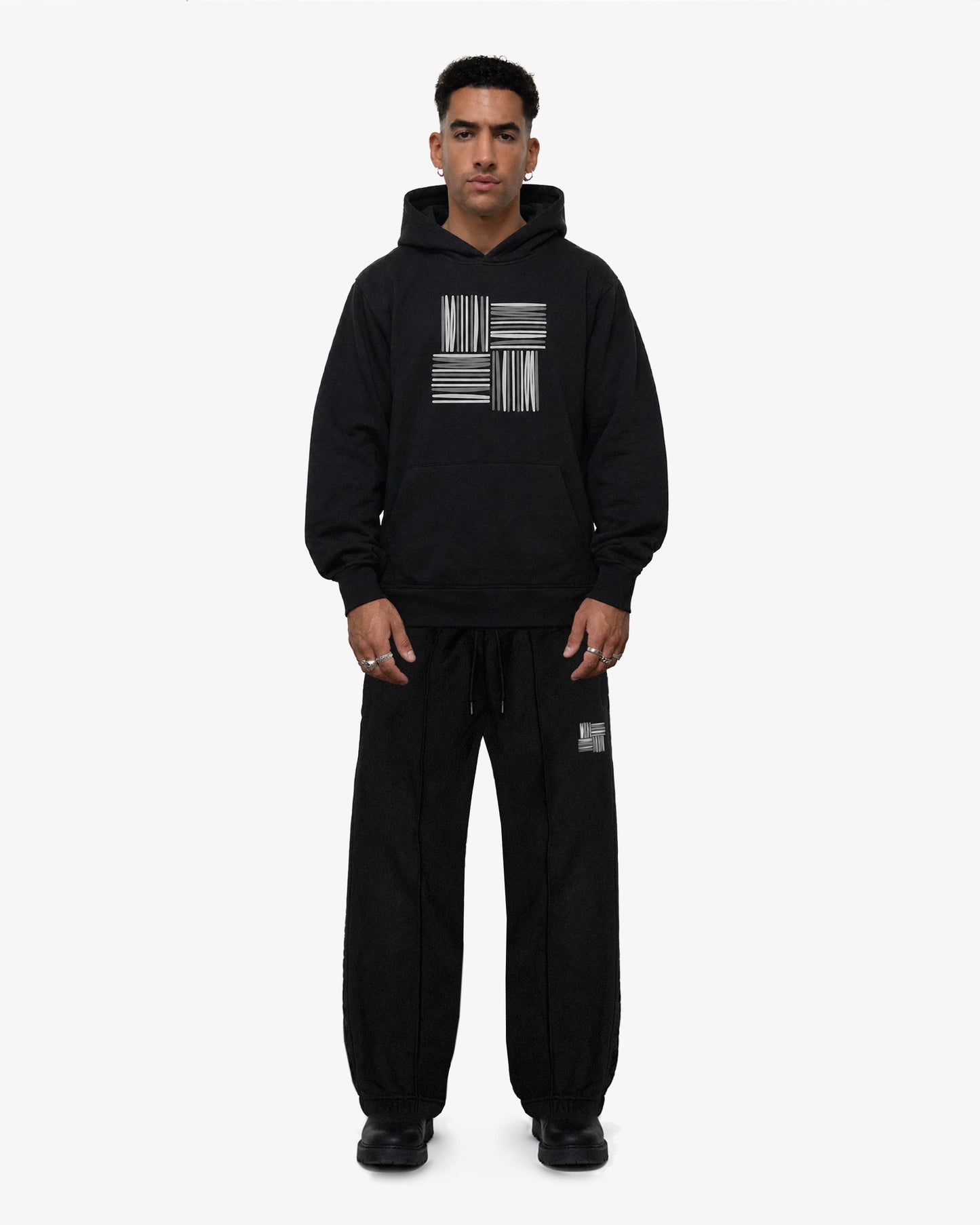 Model wears BRYDER joggers front