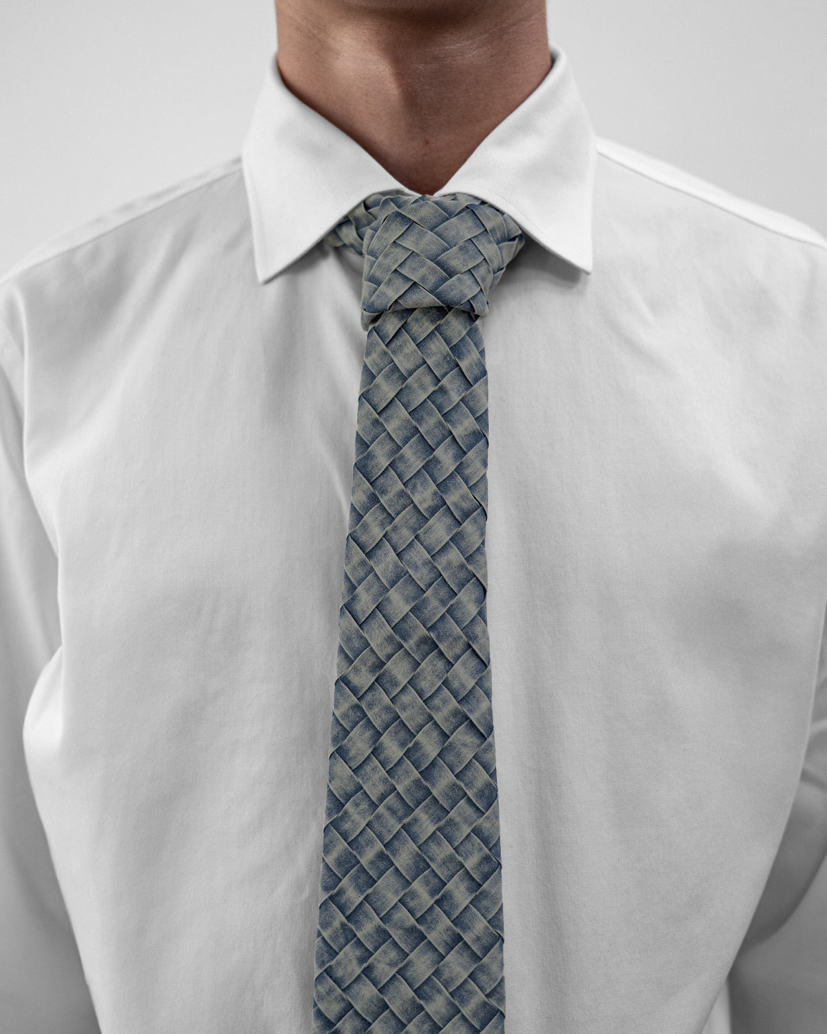 BRYDER Woven Tie in Carbon Blue — front model view